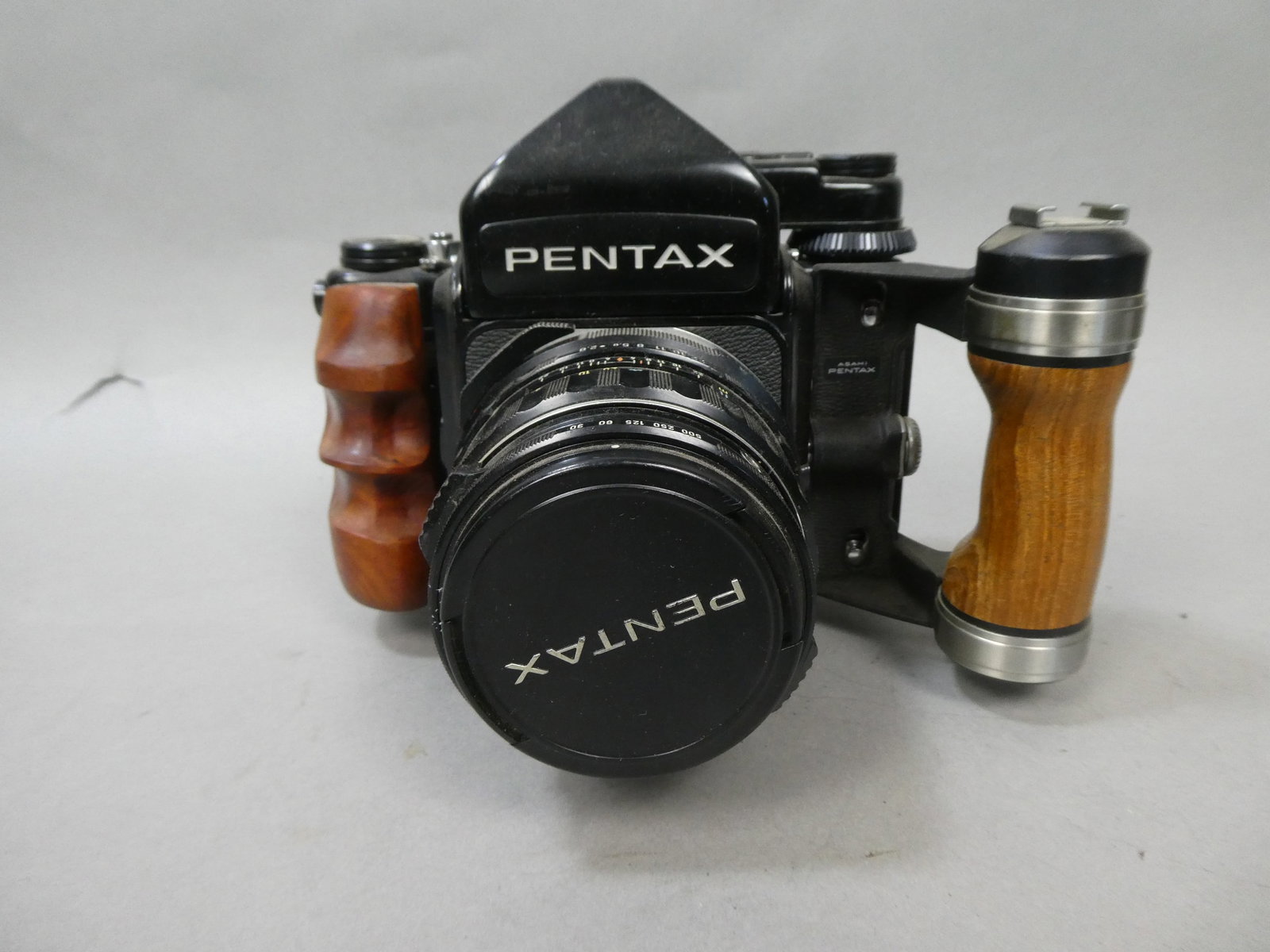 Pentax SLR 6x7 Medium Format Camera w/ Grip & Talumar 90mm f1 2.8 Lens: Pentax SLR 6x7 Medium Format Camera w/ Grip & Talumar 90mm f1 2.8 Lens This item is from a Gurnee, IL private estate. The estate included lots of cameras and accessories, motorcycles and parts, vehicl