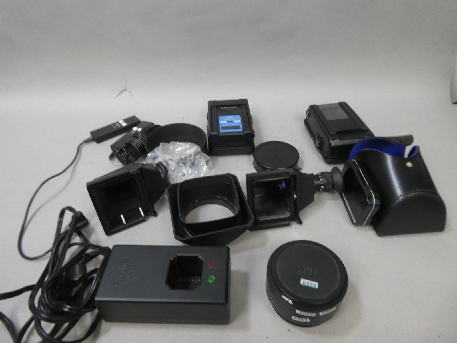 Lot Rolleiflex 6008 Camera Accessories Hood Battery Charger Flash etc: Lot Rolleiflex 6008 Camera Accessories Hood Battery Charger Flash etc This item is from a Gurnee, IL private estate. The estate included lots of cameras and accessories, motorcycles and parts, vehicle