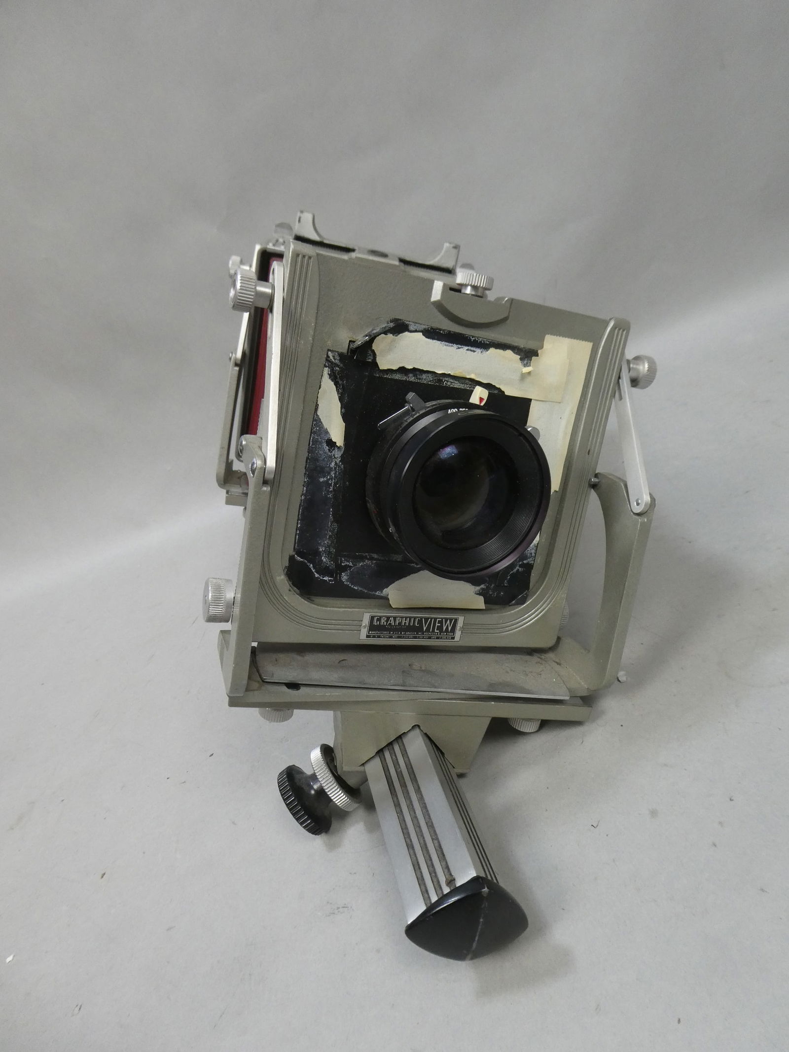 Graflex Graphic View 4x5 Large Format Camera With Red Bellows w/ 210mm Lens: Graflex Graphic View 4x5 Large Format Camera With Red Bellows with Caltar II-N 1:5,6 210mm Lens. Condition:Shows some wear with age and use, Has not been tested Shipping:We offer in-house shipping. It