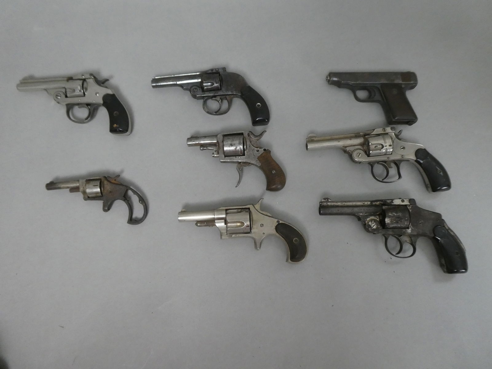 Lot 8 Assorted Antique Guns Smith & Wesson Harrington & Richardson etc: Lot 8 Assorted Antique Guns including Deutsch Werks, Smith & Wesson, E Remington & Sons, Defender 89, Harrington & Richardson and US Revolver CO There is a flat $50 FFL processing fee added to all sol