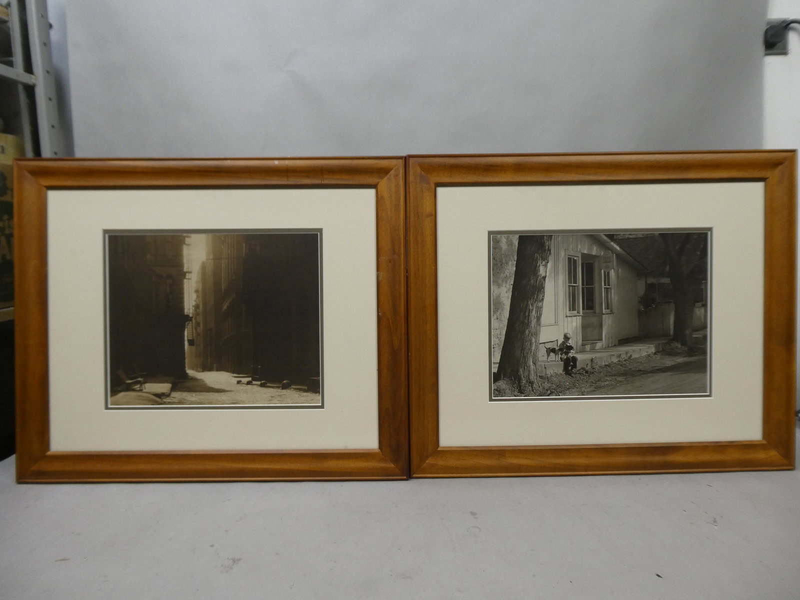 Pair Vintage Unsigned BUY Photographs OF City Street & Small Town Store: Pair Vintage Unsigned BUY Photographs oF City Street & Small Town Store framed under glass in matching frames. Measurements in inches: 23 x 19, image: 12 3/4 x 10 Condition:Good with no problems Shipp