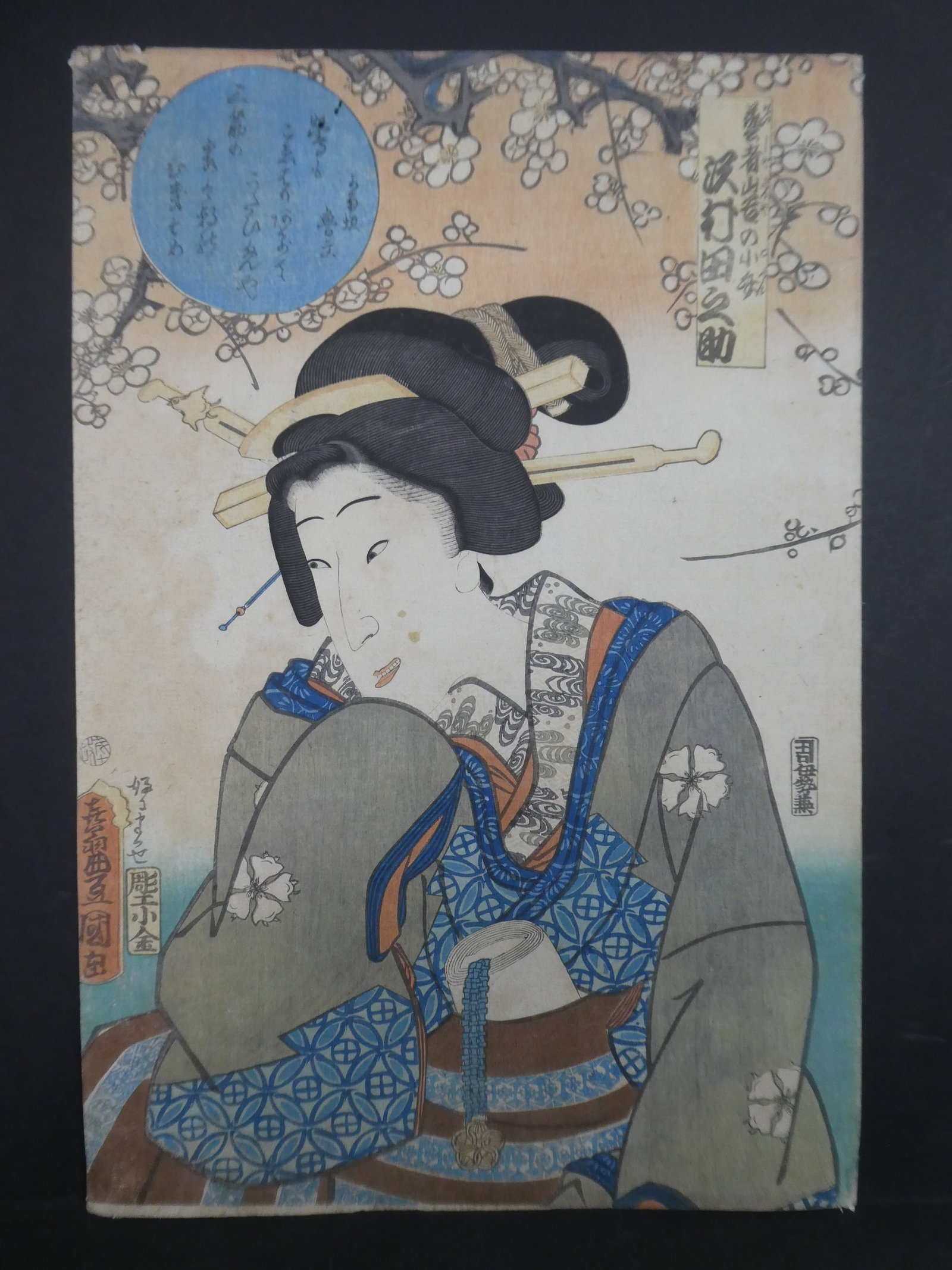 Original 19th Century Utagawa Toyokuni III Japanese Woodblock Print Woman in Robe: Original 19th Century Utagawa Toyokuni III Japanese Woodblock Print Woman in Robe. Unframed.. Measurements in inches: 9 5/8 x 14 Condition:Has fading, toning, tape residue on reverse and spotting in f
