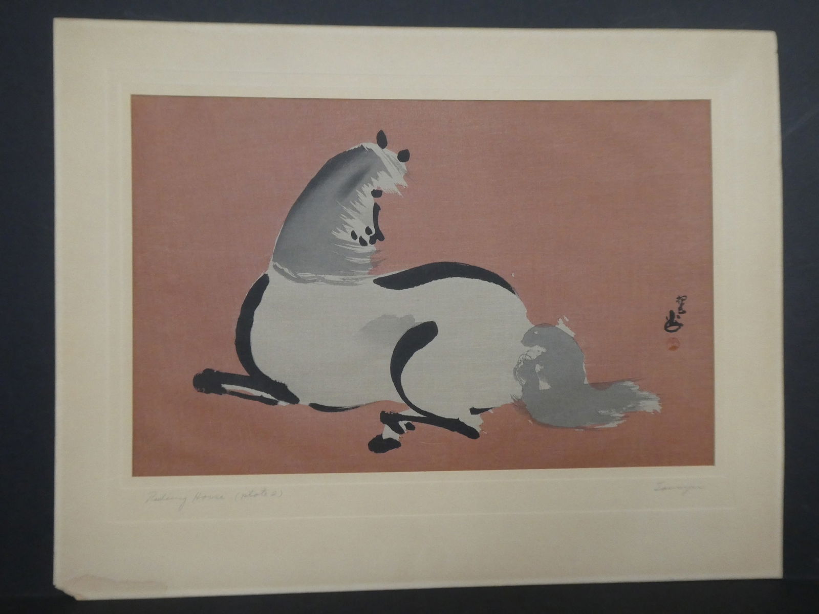 Vintage Tanyu Japanese Woodblock Print Reclining Horse (Plate 2): Vintage Tanyu Japanese Woodblock Print Reclining Horse (Plate 2). Unframed.. Measurements in inches: 15 x 9 1/2 Condition:Mild toning, tipped on paper Shipping:We offer in-house shipping. Item(s) will