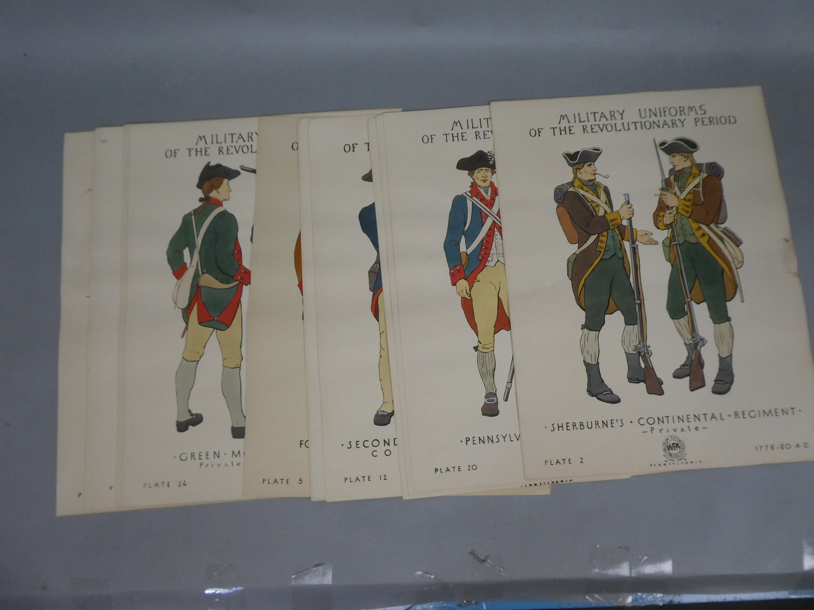 Set 20 Vintage WPA Military Uniforms of Revolutionary Period Posters: Set 20 Vintage WPA Military Uniforms of Revolutionary Period Posters. Measurements in inches: 20 x 15 Condition:All have toning. Plate 2 has tears Shipping:We offer in-house shipping. Item(s) will be 