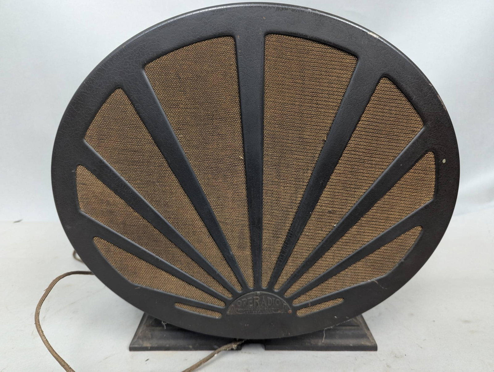 Operadio Mfg. Co. Chicago Speaker with Steel Casing: Operadio Mfg. Co. speaker with steel casing, measuring 14 inches high, 15 inches wide, and 7 inches deep. Features a fan-like front mesh grille with the Operadio nameplate. The exterior shows wear and