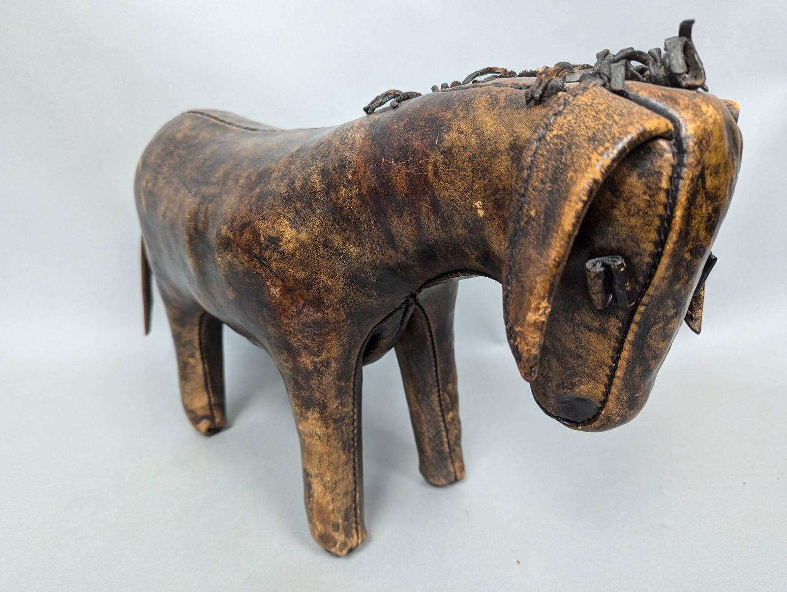 Mid-20th Century Leather Donkey Footstool by Dimitri Omersa for Liberty & Co. (1 of 7)