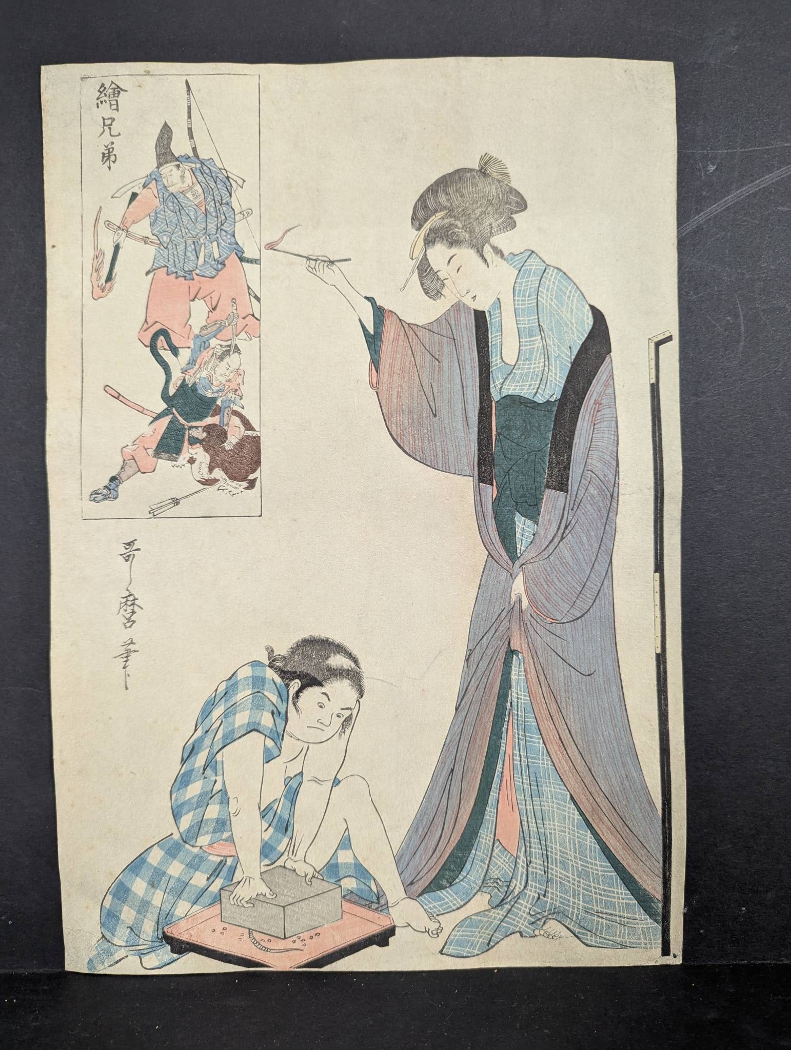 Original 19th Century Japanese Woodblock Print Eiji Brothers by Utagawa Kunisada: Original Japanese woodblock print (Ukiyo-e) by Utagawa Kunisada titled 'Eiji Brothers'. Measuring 10 x 15 the scene depicts a woman holding a stick teasing a rat and a man attempting to trap it with a