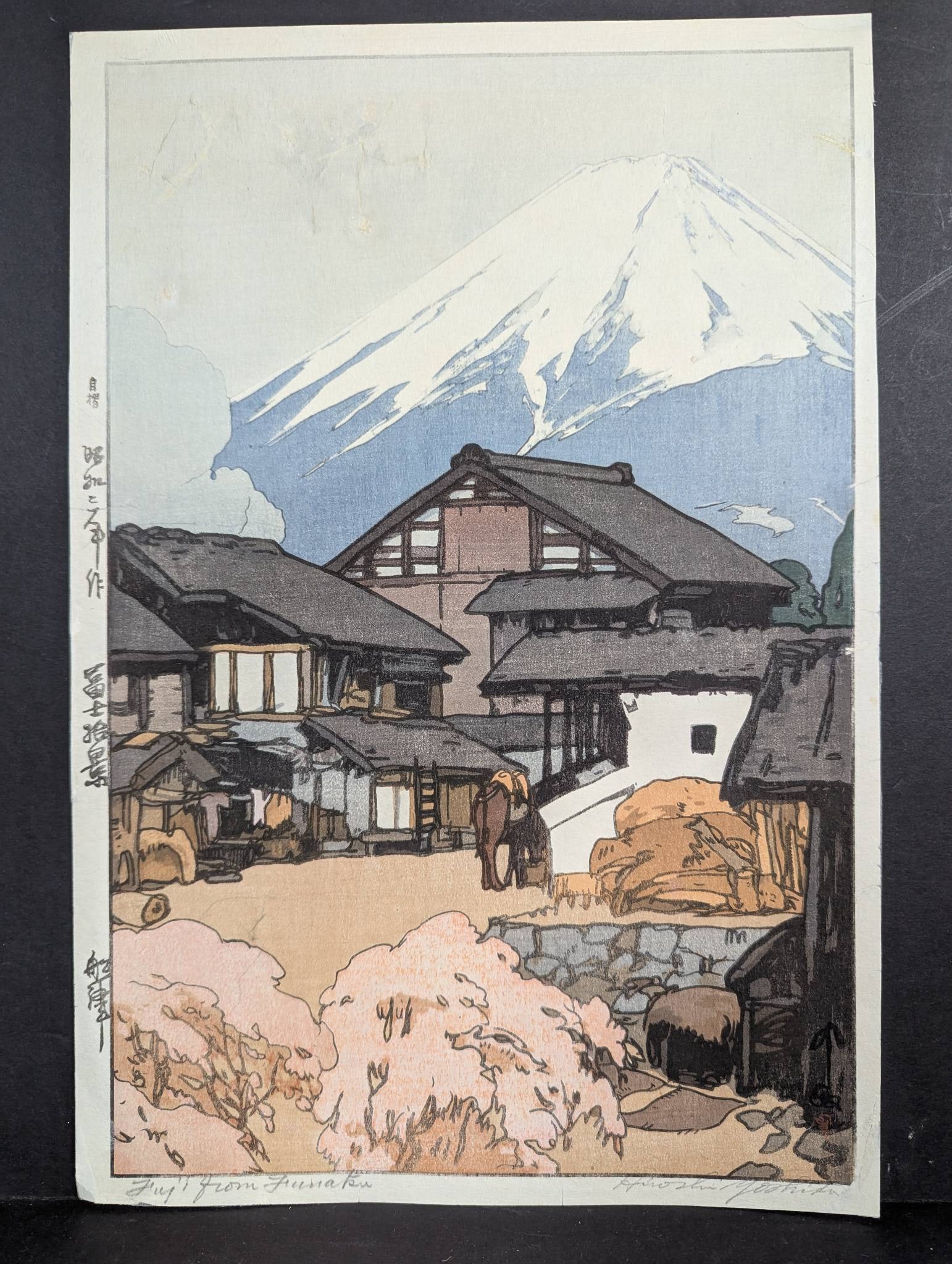 Hiroshi Yoshida Fuji from Funatsu 1928 Japanese Woodblock Print: Japanese woodblock print titled 'Fuji from Funatsu' by Hiroshi Yoshida (1876â€œ1950) dated 1928. Dimensions: 10 3/4 x 16 inches. The artwork depicts a traditional village with Mount Fu