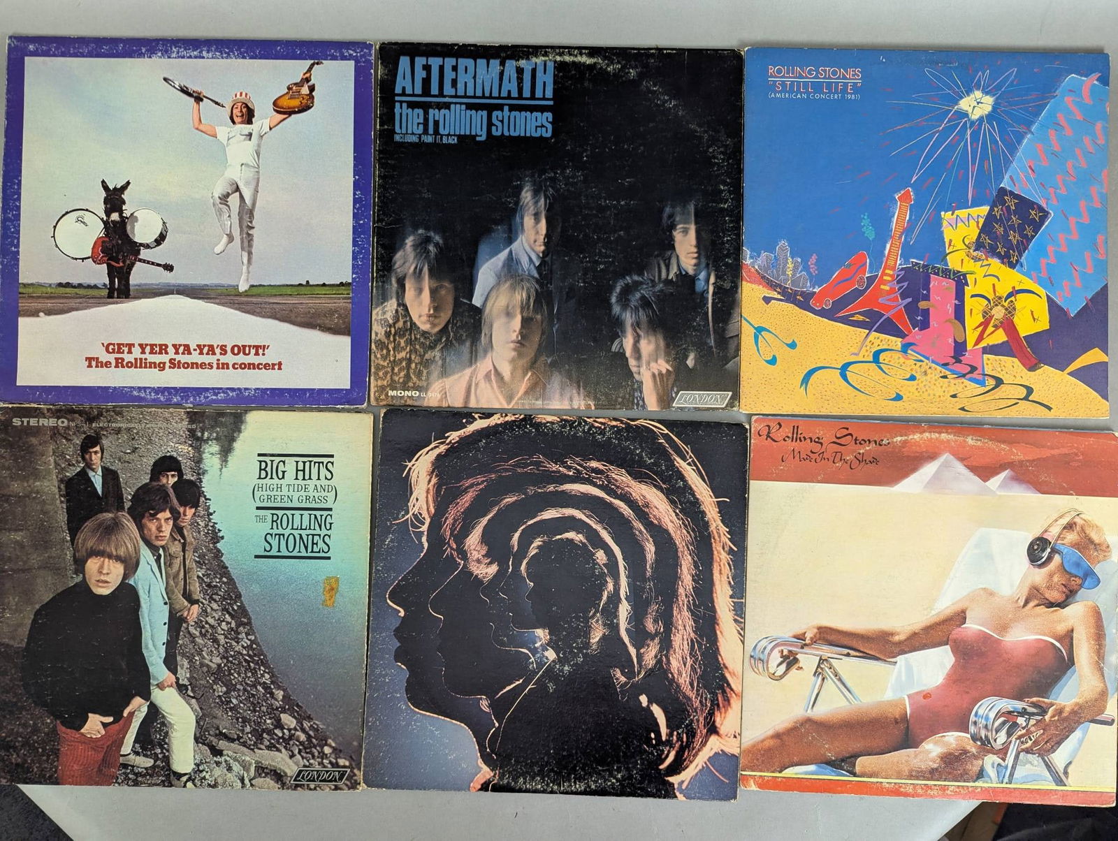 Collection of Rolling Stones Vinyl Records Featuring Multiple Album Titles (1 of 2)