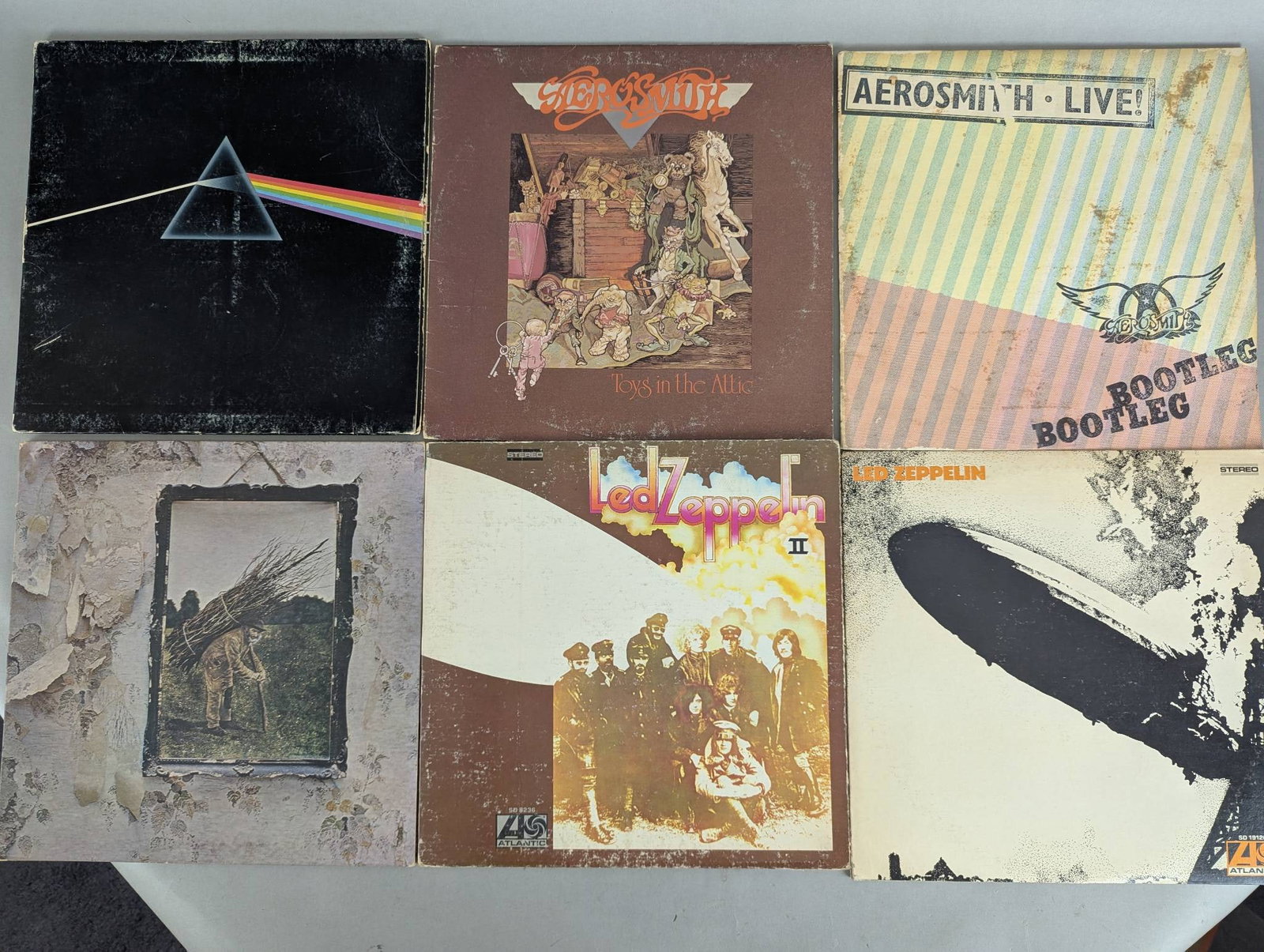 Lot of Classic Rock Vinyl Albums Featuring Pink Floyd Led Zeppelin Who Areosmith: This lot features a collection of 10 classic rock vinyl albums, including titles from legendary bands like Pink Floyd, Led Zeppelin, The Who, and Aerosmith. Albums included are Pink Floyd The Dark Sid
