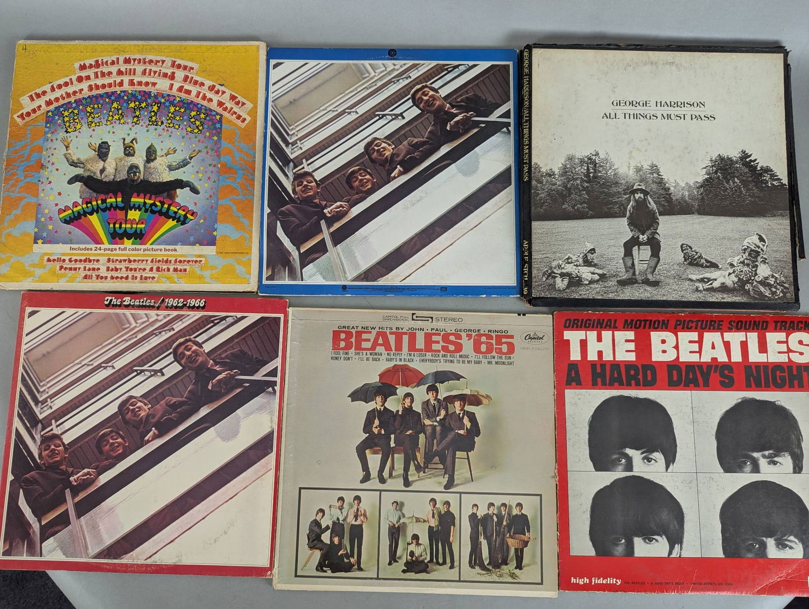 Collection of Vinyl Records Featuring The Beatles and Solo Projects (1 of 2)