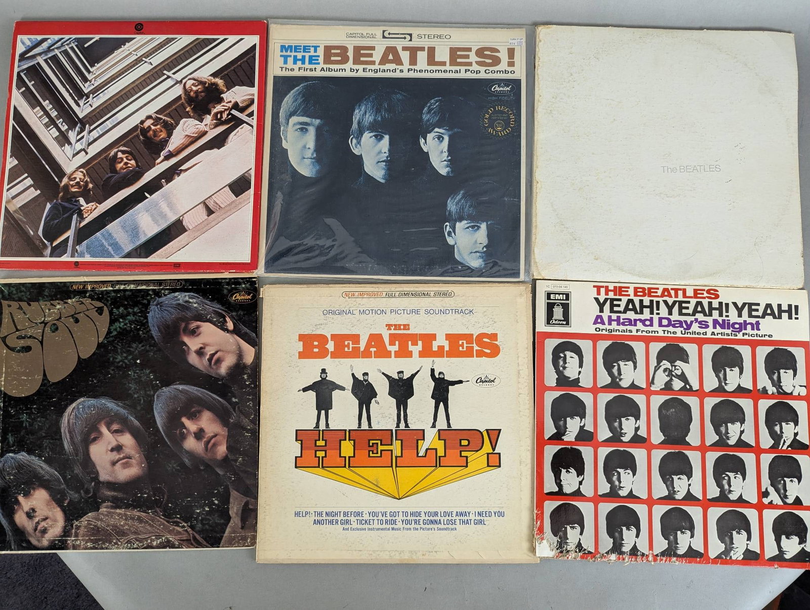 Collection of Beatles Record Albums Including Help and Revolver: This lot includes a collection of Beatles vinyl records. Titles are as follows: Help, Revolver, The Beatles Second Album, A Hard Days Night, Beatles 65, and Abbey Road.Ã‚Â Covers