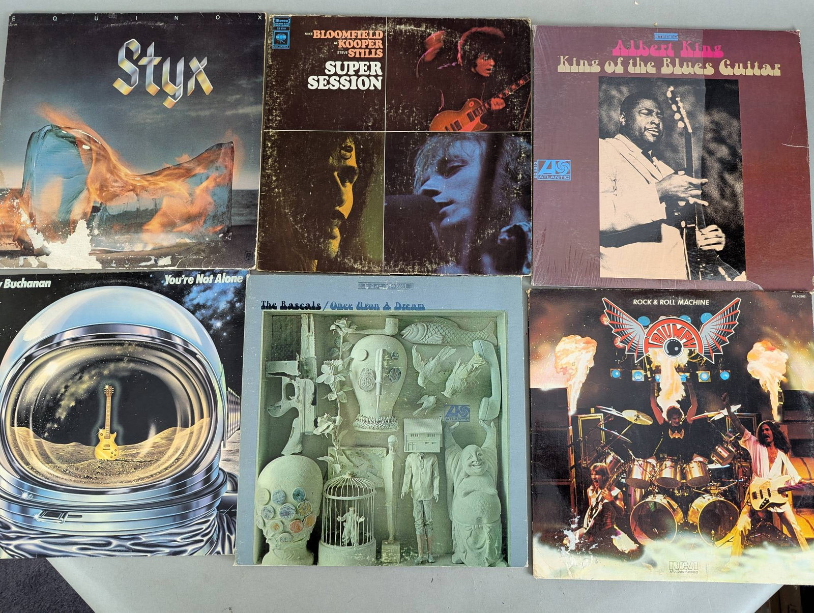 Lot of Vinyl Records Including Styx Eagles Diana Ross and More: This collection includes a variety of vinyl record albums from prominent artists and bands. Notable titles in the lot include Styx Youre No Angel, Bloomfield Kooper Stills Super Session, B B King Blue
