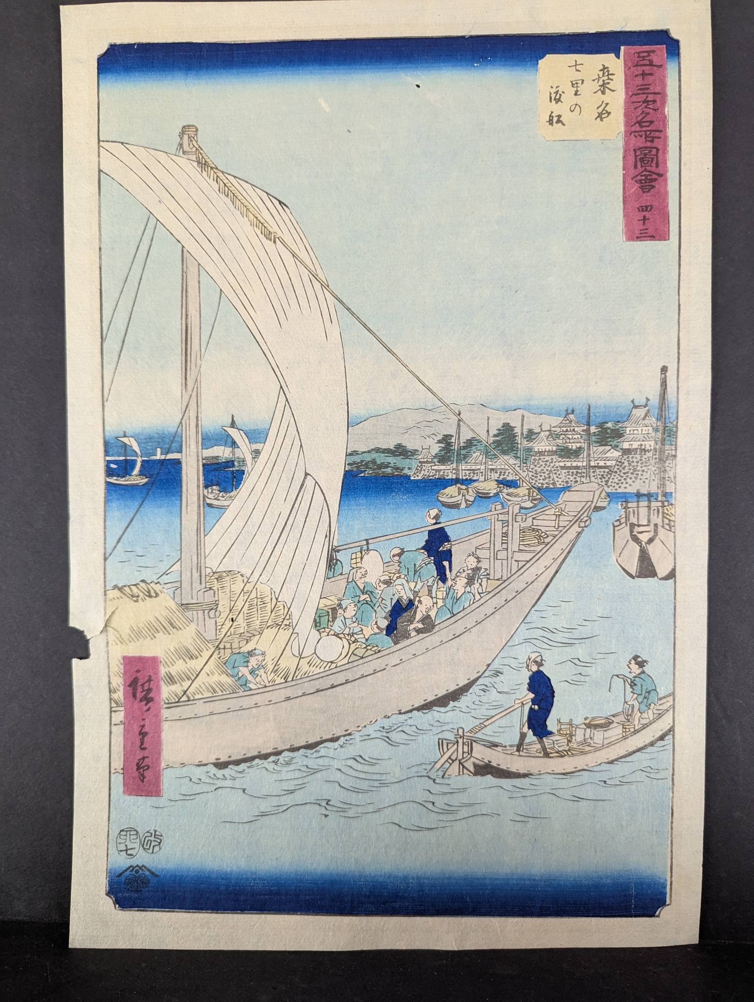 Original Japanese Woodblock Print by Ando Hiroshige Depicting Ferryboats: Japanese woodblock print by Ando Hiroshige titled No 43 Kuwana Ferryboats at Shichiri from the series Famous Sights of the Fiftythree Stations, 1855. The artwork presents a detailed view of ferryboats