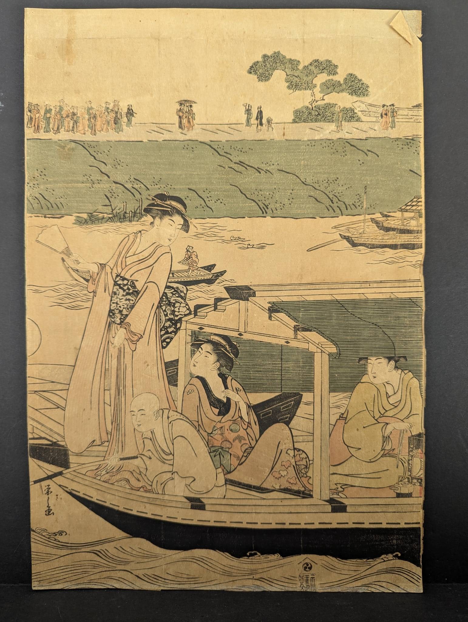 Eishi Japanese Woodblock Print Depicting Pleasure Boat On Sumida River: Original Japanese woodblock print by Eishi, dating to approximately the 1790s. The print, in tate-e oban format (approximately 15 x 10 inches), depicts a pleasure boat on the Sumida River. The scene p