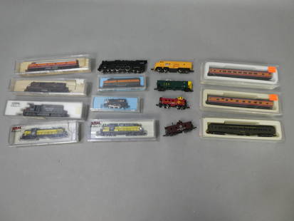 Lot 15 Vintage HO Locomotive Engines Freight & Passenger Cars: Lot 15 Vintage HO Locomotive Engines Freight & Passenger Cars by Con-cor, Atlas, Life-Like etc. 8 wide x 3 high x 3 deep. Good with no problem but has not been tested Shipping: Local pick-up or buyer-