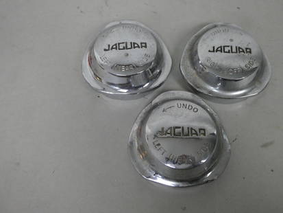 Set 3 Jaguar XKE E-Type Spinner Knock-off Wheel Caps: Set 3 Jaguar XKE E-Type Spinner Knock-off Wheel Caps. 3 diameter threads. 4 high x 4 wide x 3 deep. Has some corrosion Shipping: Local pick-up or buyer-arranged welcome. In-house shipping is available