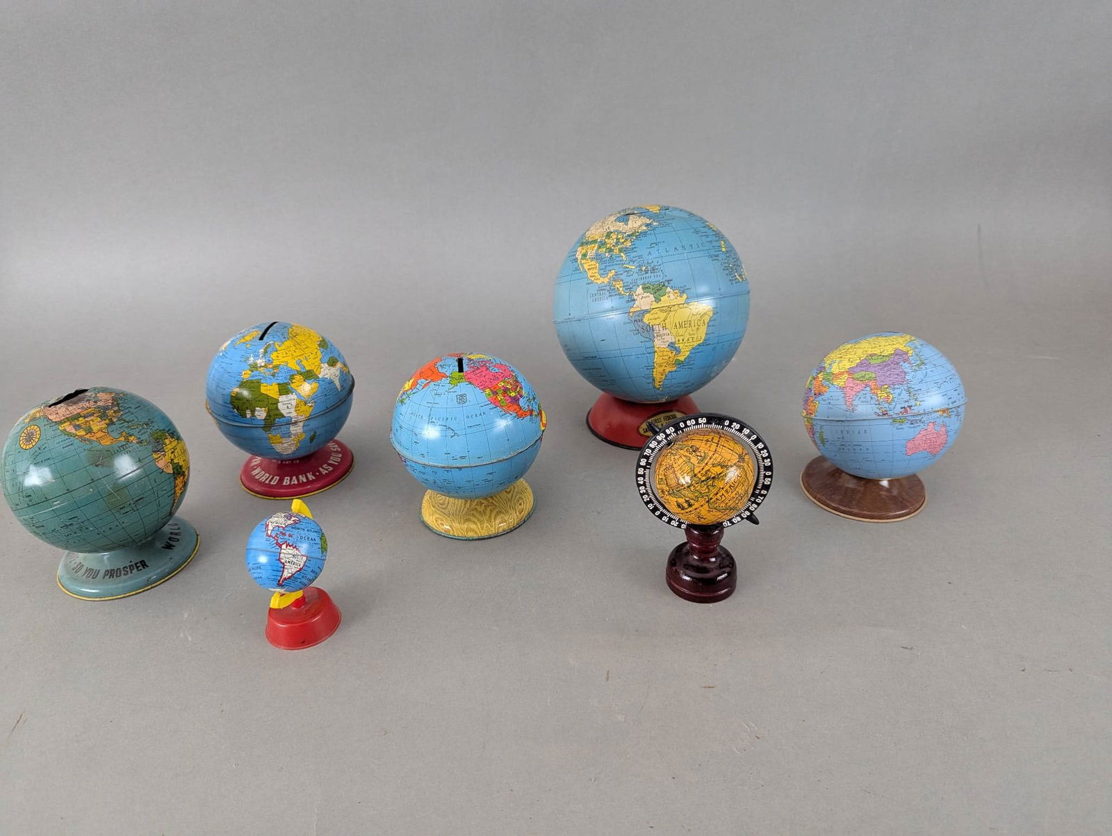 Collection of Vintage Metal and Plastic Globe Banks (1 of 9)