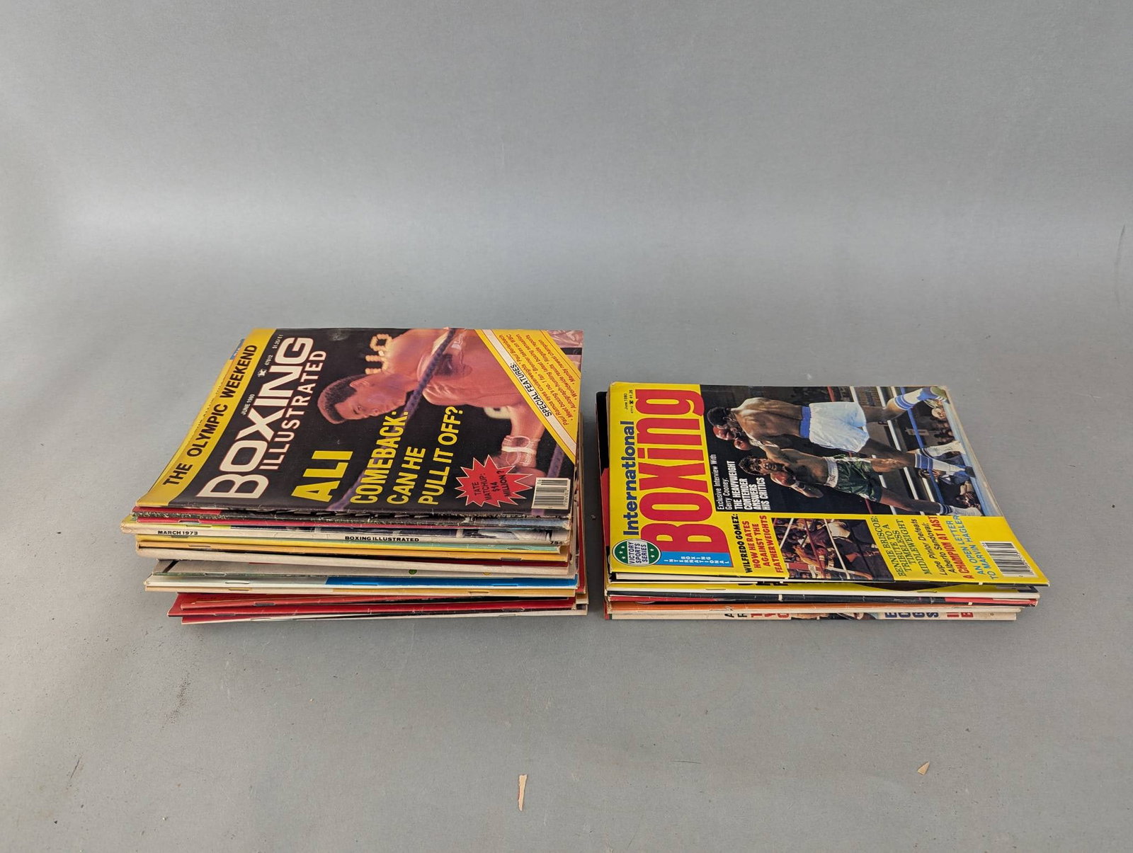 Collection of International Boxing and Boxing Illustrated Magazines: A collection comprising 10 issues of International Boxing and 24 issues of Boxing Illustrated magazines. These publications feature content on boxing news, fighter profiles, major matches, and histori