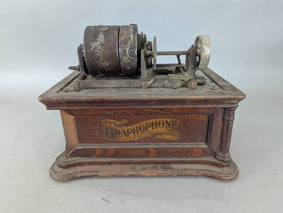Columbia Graphophone Early Phonograph for Wax Cylinders: Columbia Graphophone, an early phonograph manufactured by the Columbia Phonograph Company. This device dates to the late 1890s to early 1900s and is designed to play audio recorded on wax cylinders. I