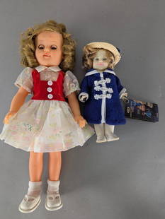 Pair of Shirley Temple Dolls with Vintage Outfits: This lot features two Shirley Temple dolls standing approximately 8 inches and 14 high x 4 wide x 3 deep, respectively. The larger doll, marked on its neck, wears a floral dress accented with a red