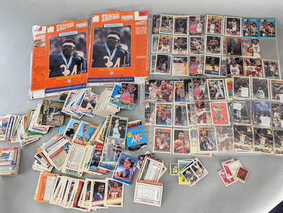 Collection of Sports Trading Cards and Walter Payton Memorabilia: Lot includes a diverse collection of sports trading cards from various sports leagues, featuring baseball, basketball, and football players. Brands include Topps, Fleer, and other manufacturers. The c