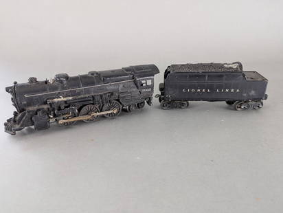 Lionel 2035 Locomotive Engine With 6466w tender: Lionel 2035 steam locomotive engine paired with a 6466W whistle tender. Both items exhibit visible wear consistent with use and age. The engine wheels move freely, but the items have not been tested f