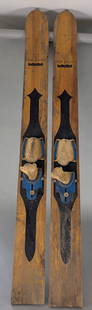 Sea King Deluxe Outboard Wooden Water Skis with Bindings: Sea King Deluxe Outboard wooden water skis featuring metal bindings and measures 72 high x 6 1/2wide x 1 deep inches each. The skis display a natural wood finish with black painted accents and blue