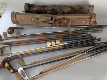 Lot of Assorted Vintage Golf Clubs & Balls with Canvas and Leather Bags: Group of vintage golf clubs including a mix of wood-shafted and steel-shafted models with various club heads. Included with the clubs are three dimpled golf balls and two canvas and leather golf