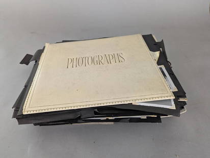 Mid 20th Century Family Photo Album Collection: A mid 20th century family photo album containing numerous black and white photographs showcasing family life, events, and scenes from various periods, including the 1940s and 1950s as marked on some