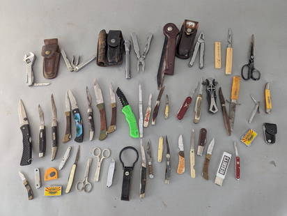 Collection of Assorted Pocket Knives Multitools and Accessories: A diverse collection of assorted pocket knives, multitools, and accessories. Includes folding knives with various handle designs and materials, multitools with multiple functionalities, and vintage as