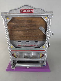 Â Field Mfg 3 Jacks Counter Pocket Penny Flip Trade Stimulator: Recreation of the Field Manufacturing 3 Jacks counter pocket penny flip machine. Constructed with an aged aluminum casting featuring new paint and wood elements. Functional as a penny flip machine, al