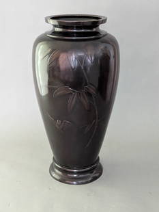 Japanese Meiji Period Bronze Vase with Bird and Bamboo Design: Japanese bronze vase likely from the Meiji period (circa 1870-1900), featuring an engraved bird and bamboo motif, a hallmark of the era&#226;&#8364;&#8482;s artistry. The vase has an elegant silhouett