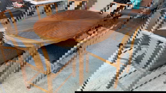 Michael Taylor Walnut Dining Table with Six Chairs and Three Leaves: Dining furniture set designed by Michael Taylor for Baker Furniture as part of the Far East Collection from the 1950s. The set includes six walnut dining chairs with black upholstered seats and a matc