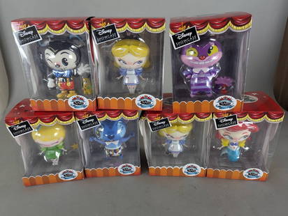7 Disney Showcase Vinyl Figures by Miss Mindy New: Seven Disney Showcase Collection vinyl figures designed by Miss Mindy. The characters featured are Mickey Mouse, Alice from Alice in Wonderland, Cheshire Cat, Ariel from The Little Mermaid, Tinker Bel