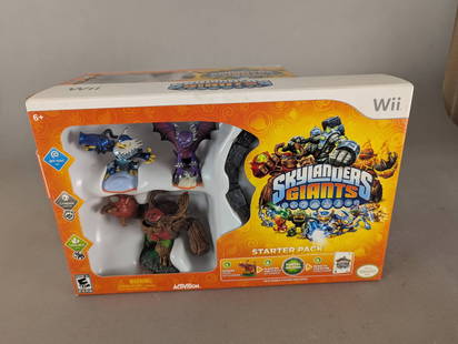 Skylanders Giants Wii Starter Pack Lot of 4 Sets: Four Skylanders Giants Wii Starter Packs, each featuring a game disc, Portal of Power, and collectible character figures. This lot includes sealed original packaging, designed for use with the Nintend