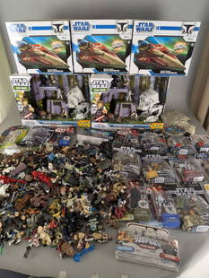 Huge Lot of Star Wars Action Figures Vehicles and Playsets: Massive assortment of Star Wars toys including action figures, vehicles, playsets, and collectibles. Highlights include boxed items such as multiple Delta Starfighter vehicles and the Mission on Endor