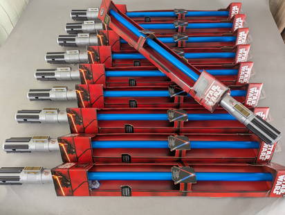 10 Star Wars Reys Lightsaber with Battle Clash Feature New: 10 Star Wars Reys Lightsaber toys manufactured by Disney. Each lightsaber measures 34 high x 4 wide x 4 deep and features a Battle Clash rumble effect for enhanced play experience. Items are new and c