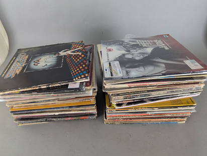 99 Record Albums Featuring Various Artists and Genres: 99 record albums featuring various artists and genres, ranging from rock, pop, and country to jazz and soundtracks. Notable albums visible in this lot include works by Styx, Elvis Presley, Willie Nels