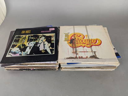 42 Record Albums Featuring The Doors Rush Police Hendrix etc: 42 record albums featuring a variety of artists and genres. Album titles include works by The Doors, Chicago, Jimi Hendrix Experience (Smash Hits), Jefferson Starship (Red Octopus), The Police, George