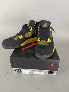 Air Jordan 4 Retro Black and Yellow with Original Box Size 13: Air Jordan 4 Retro sneakers in black and yellow colorway, featuring a size 13 fit. Shoes include black suede uppers, yellow mesh accents, and a black rubber outsole with yellow detailing. The shoes co