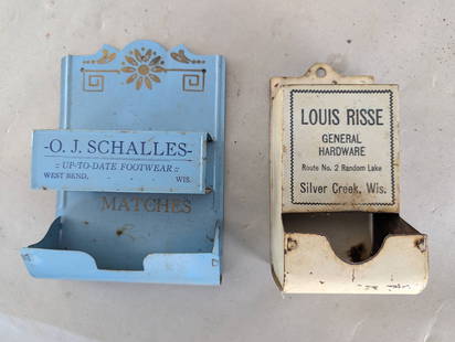 Antique Metal Match Holders Advertising O J Schalles and Louis Risse: Metal match holders featuring advertising designs. The first holder, measuring approximately 7 high x 5 deep x 2 wide inches, is powder blue with graphics promoting O J Schalles Up-To-Date Footwear fr