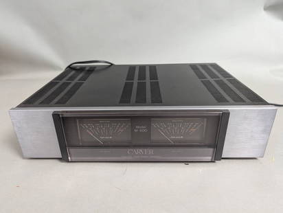 Carver Model M-500 Stereo Amplifier with Dual Meters: Carver Model M-500 stereo amplifier featuring dual peak level dB meters on the front panel. The amplifier measures approximately 13 inches in height, 17 inches in width, and 4 inches in depth. The uni