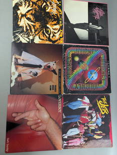 Vintage Vinyl Records Featuring Various Artists and Genres Lot of 30: Vintage vinyl records showcasing diverse artists and music genres. Albums include Loverboy by Loverboy, Make It Big by Wham, Cargo by Men At Work, IV by Toto, Body Heat by Quincy Jones, 4 by Foreigner