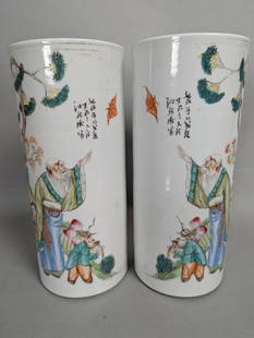 Chinese Famille Rose Porcelain Vases with Painted Figures Signed: Chinese Famille Rose porcelain vases, likely from the 19th or early 20th century. Each vase measures 11 high x 5 wide x 5 deep. Decorated with hand-painted scenes featuring elderly figures and childre