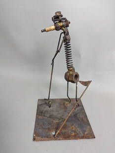 The Ugliest Golfer Sculpture by Richard Cooley, Welded Metal Art: Original vintage scrap metal sculpture titled The Ugliest Golfer by artist Richard Cooley. Constructed from salvaged metal materials such as nuts, bolts, springs, and a spark plug forming the head, it