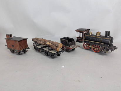 Antique Marklin Gauge 1 Clockwork Loco with Tender Log Cars and Box Car: Marklin gauge 1 clockwork locomotive with tender, log cars, and a box car. The locomotive measures 10 inches high x 3 inches wide x 5 inches deep. This wind-up piece runs, but the key is not included.