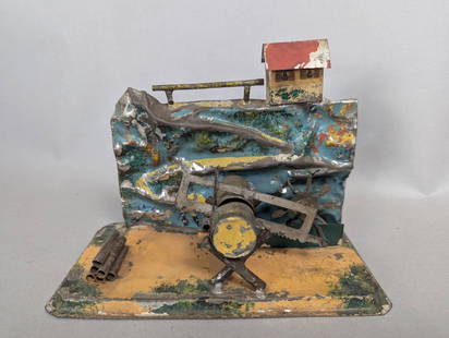 Tin Steam Engine Sawing Log Accessory Possibly by Plank C 1910: Tin steam engine sawing log accessory from circa 1910, possibly created by manufacturer Plank. The dimensions are approximately 5 inches high, 7 inches wide, and 3 1/2 inches deep. The piece includes