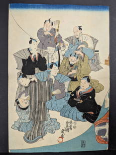 Japanese Woodblock Print by Utagawa Kunisada Group Scene 19th Century: This Japanese woodblock print by Utagawa Kunisada (1786-1865) features a detailed group scene rendered in the distinctive ukiyo-e style. Measuring 10 inches in height and 14 1/2 inches in width, this