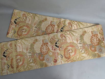 Pre World War II Japanese Silk Maru Obi with Floral and Phoenix Design: A Pre World War II Maru Obi crafted from luxurious Japanese silk. This obi features a detailed design of floral motifs interspersed with phoenix imagery rendered in soft hues and gold accents. Measuri